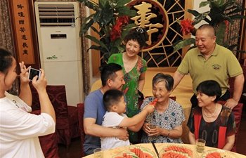 Seniors Have Family Reunion During Mid-Autumn Festival in Hu